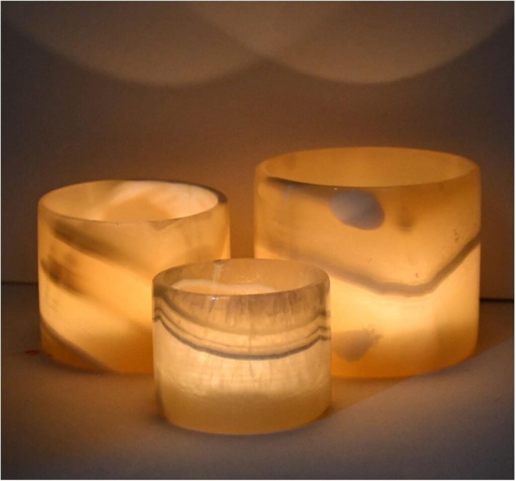 Hand-carved alabaster candle holder with soft glow