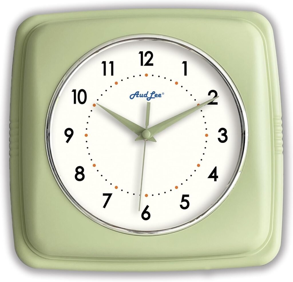 A round wall clock with a chrome frame, diner-style design