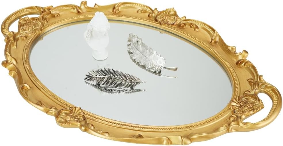 A reflective gold tray with baroque-style edges