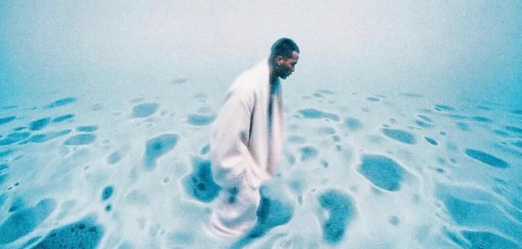 A captivating look into Skylrk’s visual identity — blending softness, futurism, and soul. This teaser image from the brand’s early promo materials showcases a figure in a plush robe walking across a glowing blue surface, evoking calm, curiosity, and a sense of cosmic loungewear. Save this if you’re into fashion that feels like a dream sequence.