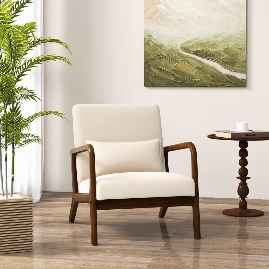 With soft curves, a compact shape, and a neutral palette, this cream accent chair brings Japandi-inspired calm. It includes a lumbar pillow and rounded arms that make it ideal for reading nooks or quiet living rooms. One of our favorite affordable accent chairs for creating a clean but cozy corner. Proof that comfort and aesthetic don’t have to compete — especially at this price point.