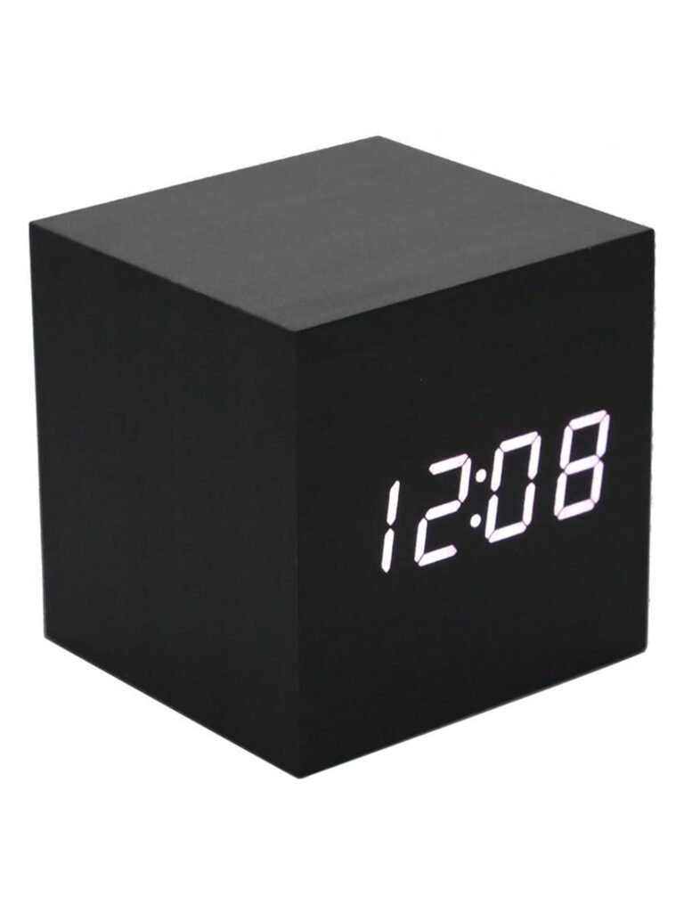 A sleek black digital cube clock with sound-activated display. Clean, quiet, modern.