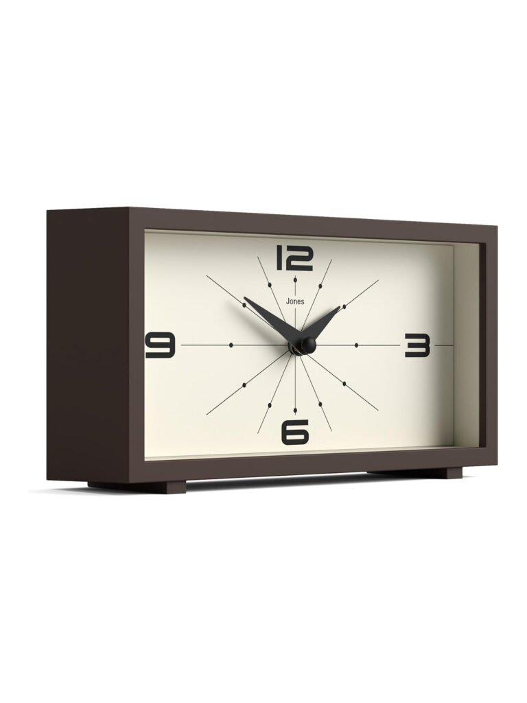 A sleek rectangular desk clock that blends midcentury charm with minimalist form.
Alt Text: Rectangular modern desk clock with a clean face, sitting on a wooden surface.