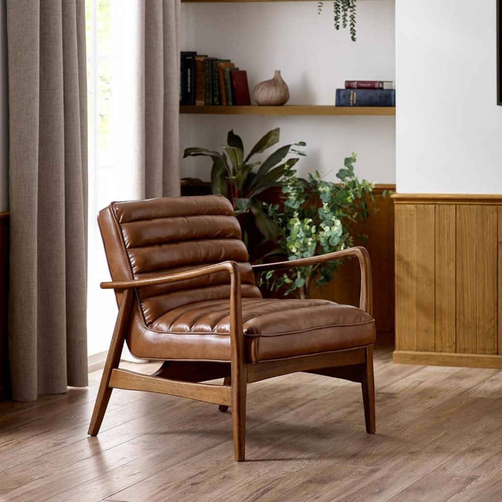 Tufted brown faux leather accent chair with angled mid-century wood frame.
