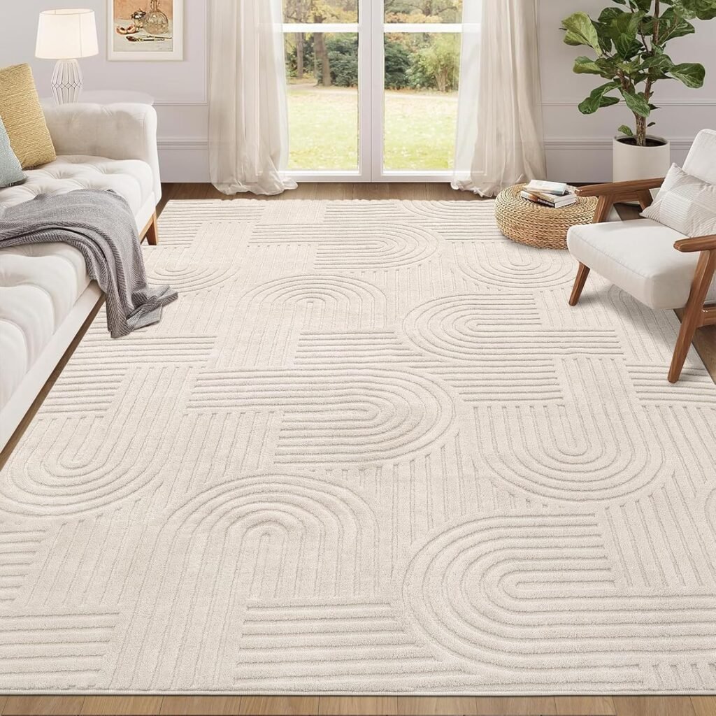 Sculpted cream geometric rug with arched patterns in a bright modern living room