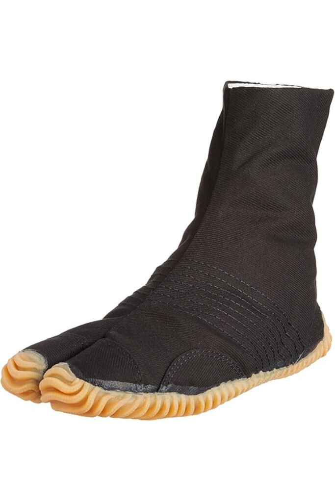 Traditional Japanese jika-tabi boots made for martial arts and physical movement, but now finding a second life in modern fashion. These canvas and rubber tabi shoes are functional, lightweight, and feel like the spiritual ancestor to the Yeezy Pod. Whether you’re going for a utilitarian look or trying out heritage silhouettes, these add a strange, intentional presence to any fit.