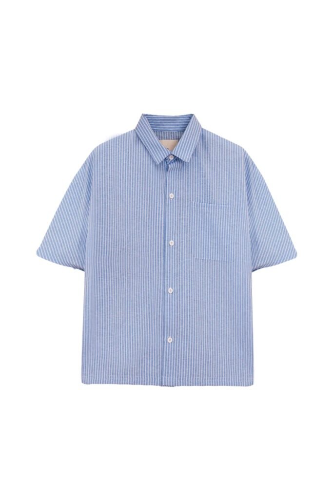 This airy shirt is built for layering over vests—essential for heatwave-ready summer outfits men love.