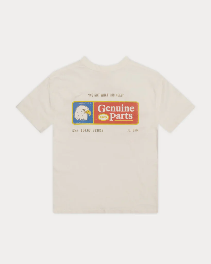A cream tee with bold back graphic detailing. Adds subtle attitude to any relaxed summer outfit for men.