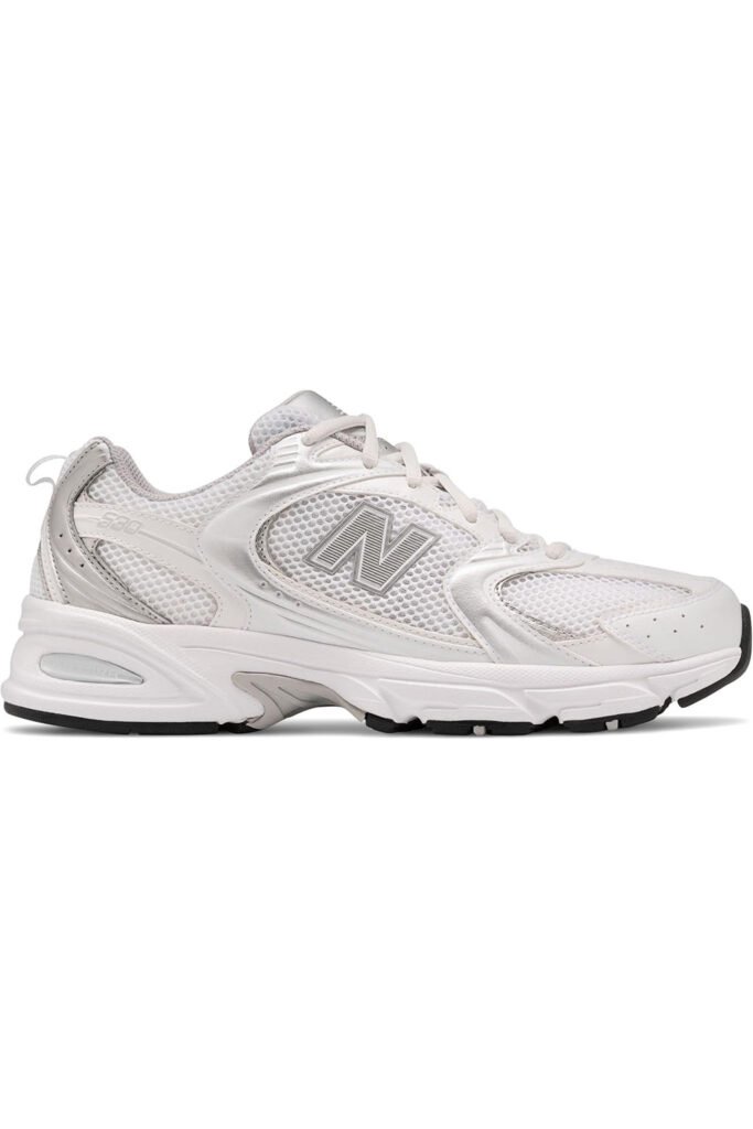 White and silver New Balance 530 sneaker with mesh panels and retro silhouette, laid out on a white background. men's summer shoes