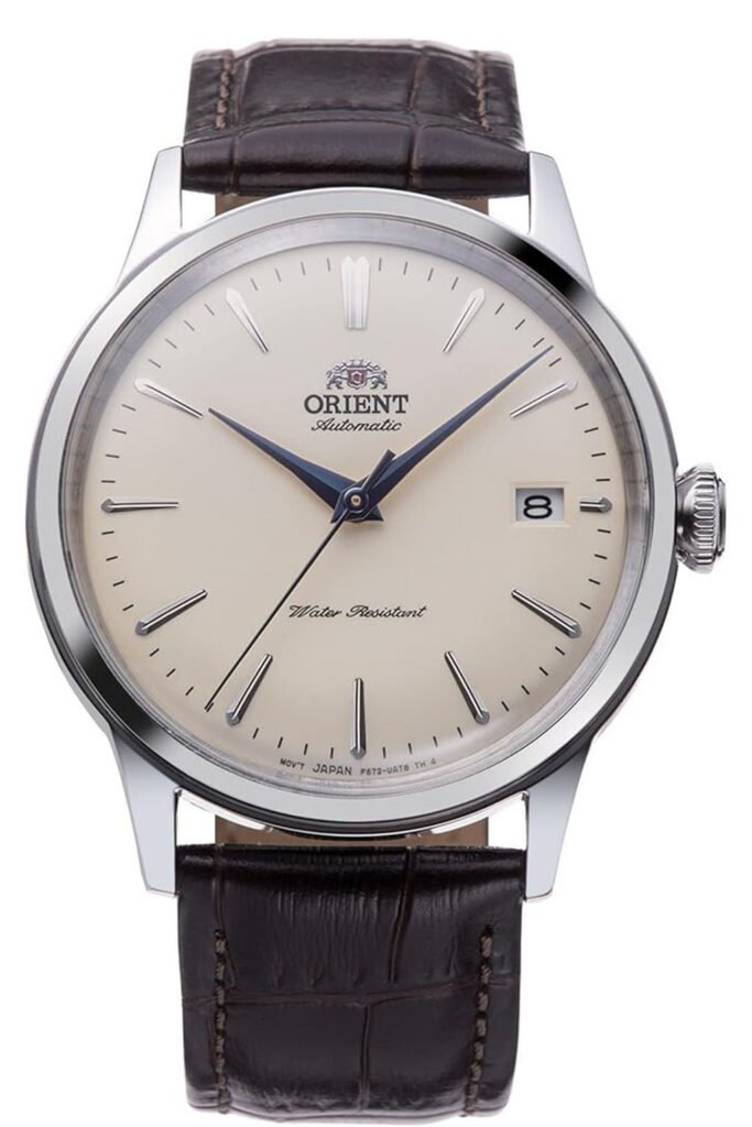 Close-up of Orient Bambino automatic leather strap watch with cream dial